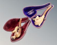 Two 19th century Meerschaum pipes in cases.