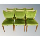 A set of six beech salon chairs in green dralon upholstery.