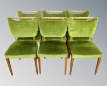 A set of six beech salon chairs in green dralon upholstery.