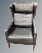 A late 20th century Scandinavian black leather wingback armchair.