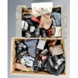 Two boxes containing vintage and later cameras including Praktica, Ricoh, Kodak etc.