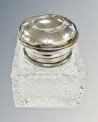 A silver-topped crystal inkwell, height 7.