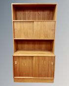 A Scandinavian 20th century teak two section bookcase (width 90cm),