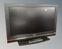 A Humax 32" LCD TV with remote.