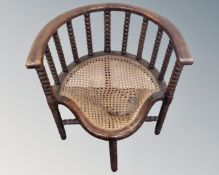 An Edwardian beech wood bobbin chair with bergere seat (as found)