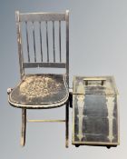 A 19th century coal receiver together with an ebonised folding chair.