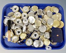 A tray containing a quantity of contemporary pocket watch movements and cases.