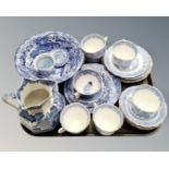 A tray containing eight pieces of Spode willow pattern and Italian blue and white china,