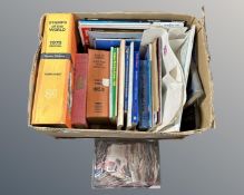 A box containing a quantity of loose world stamps, stamps on paper,