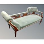 A Victorian inlaid mahogany chaise longue in green buttoned dralon