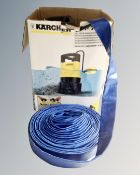 A Karcher SDP 7000 water pump with hose.