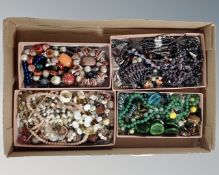 A tray containing a quantity of gemstone,