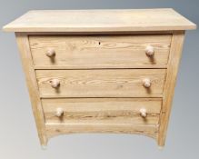 A 20th century Scandinavian pine three drawer chest.