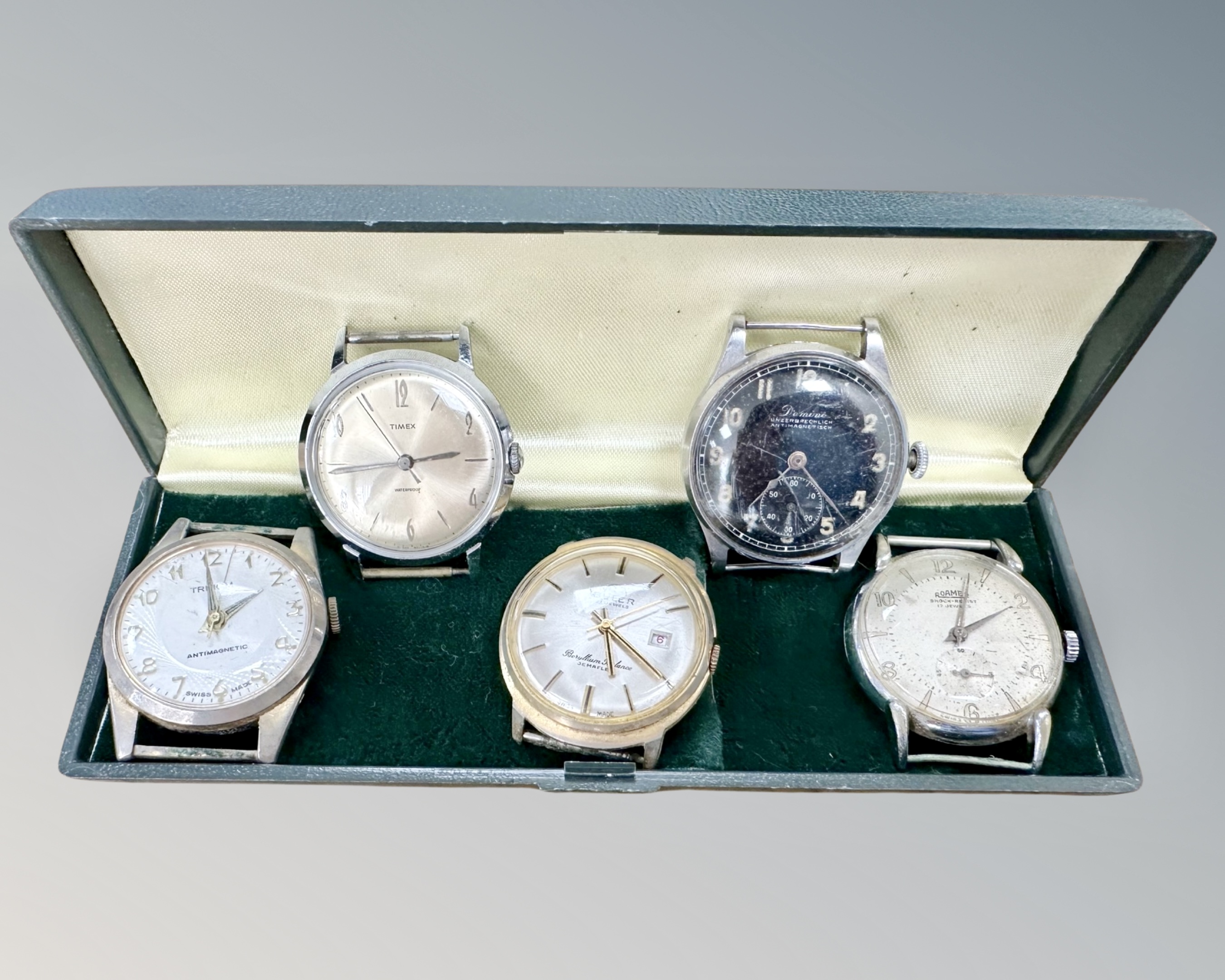 Five vintage gent's wristwatch faces to include Trinom, Timex, Buler, Domino and Roamer.