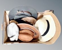 A box containing assorted lady's and gent's hats including Australian cowhide Swagman hat.