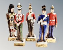 A set of five ceramic military figures.