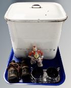 A tray containing a vintage enamelled lidded bread bin, a ceramic figure of a clown,