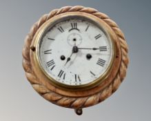 A 19th century nautical clock.