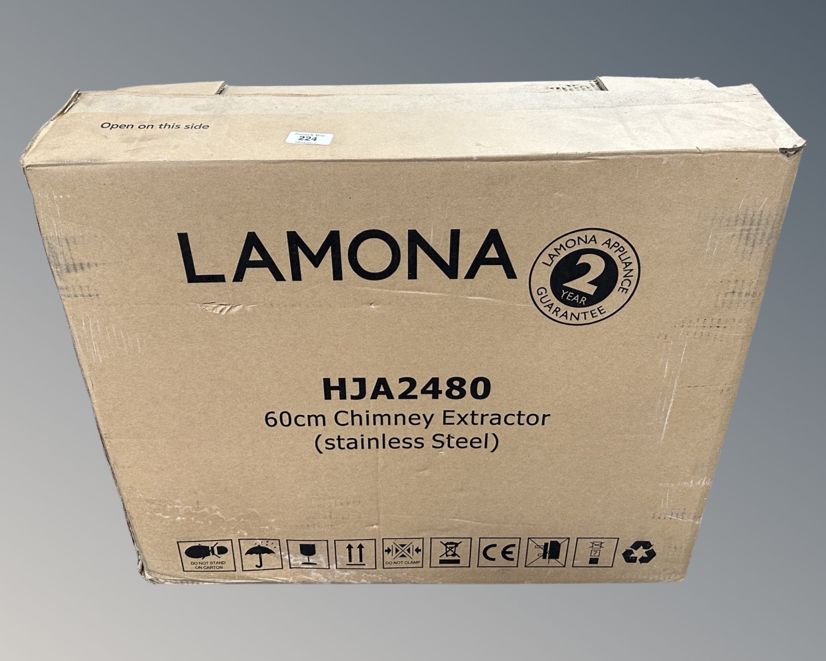 A Lamona 60cm stainless steel chimney extractor, boxed.