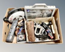 A box containing door handles, drill bit set, extension lead, woodworking plane etc.