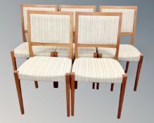 A set of five teak framed chairs in oatmeal fabric.