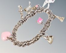 A Links of London silver bracelet with seven charms, 75.3g.