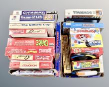 Two boxes of assorted board and electronic games