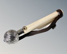A 19th century bone parasol handle with silver pommel, London 1912.
