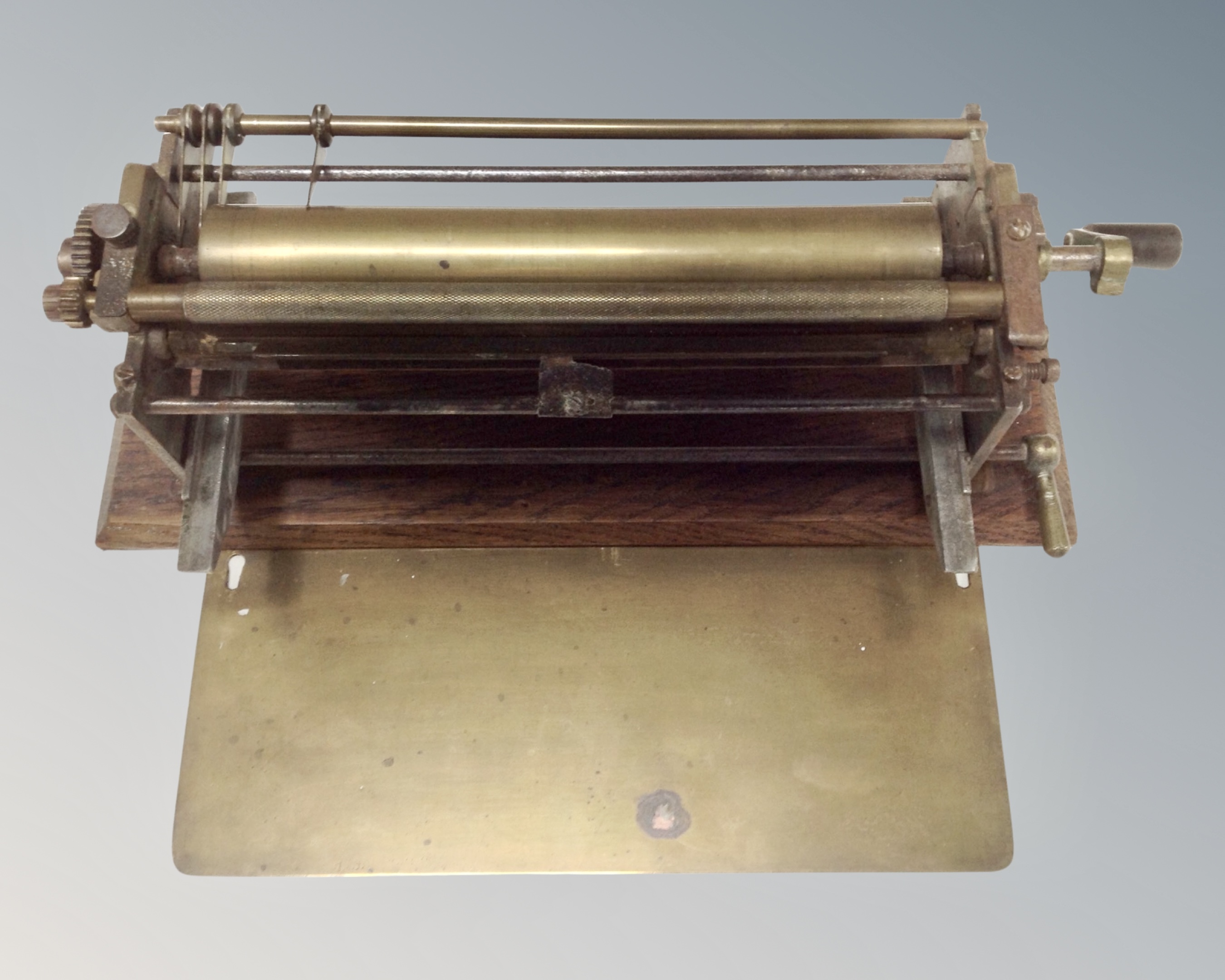 A Victorian book binder mounted on an oak board.