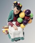 A Royal Doulton figure 'The Old Balloon Seller' HN 1315