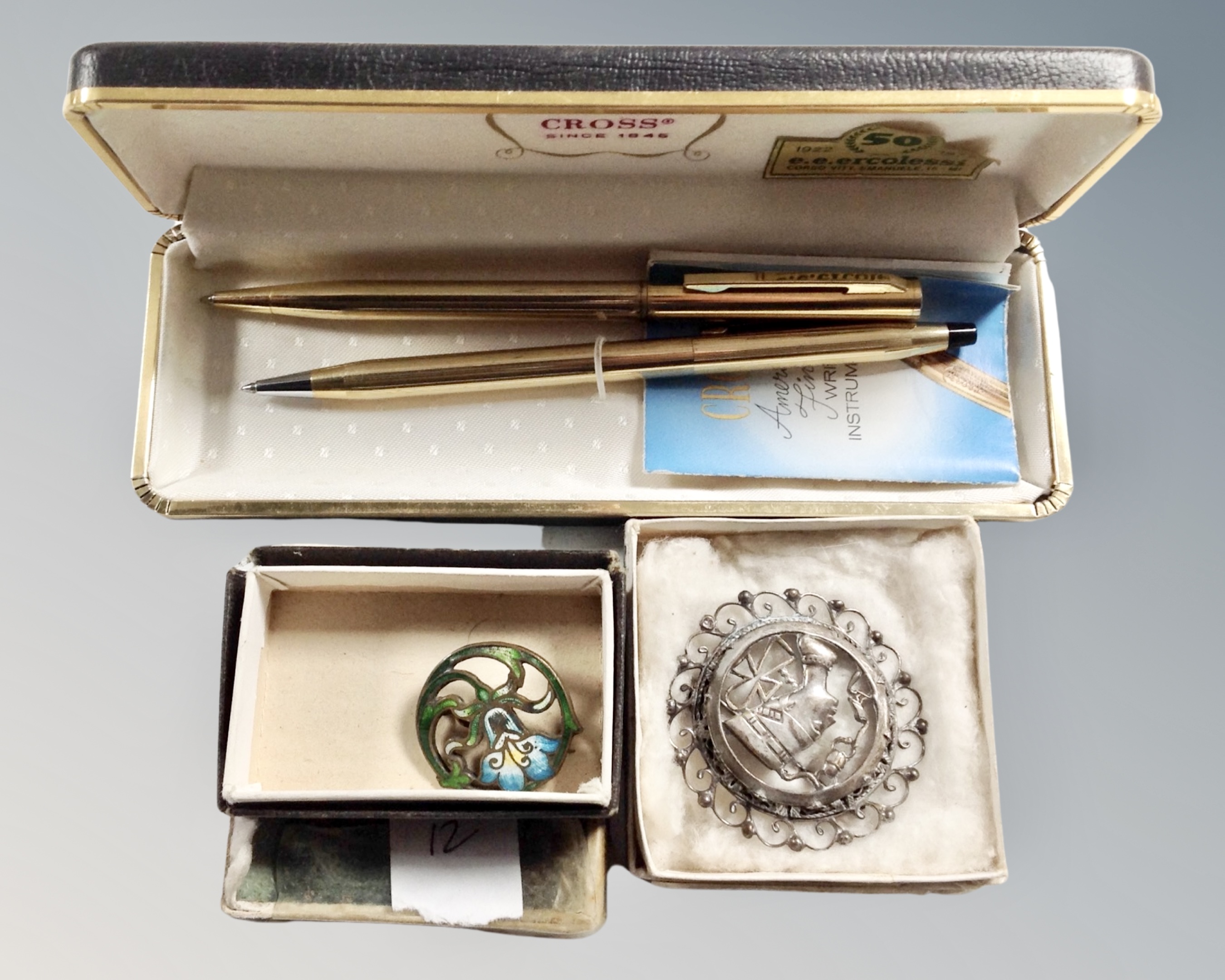 A Cross twin pen set in case together with Art Deco enamelled brooch and further Egyptian style