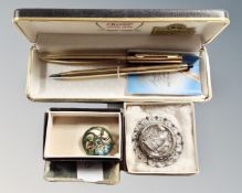 A Cross twin pen set in case together with Art Deco enamelled brooch and further Egyptian style