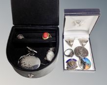 Two jewellery boxes containing costume and silver jewellery, lockets, chains, brooches,
