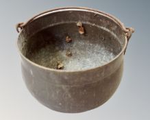 A 19th century copper cast iron cooking pot, diameter 38 cm.