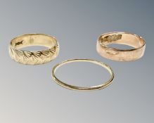Three 9ct yellow gold band rings, 4.5g.