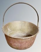 A 19th century copper cast iron handled jam pan,
