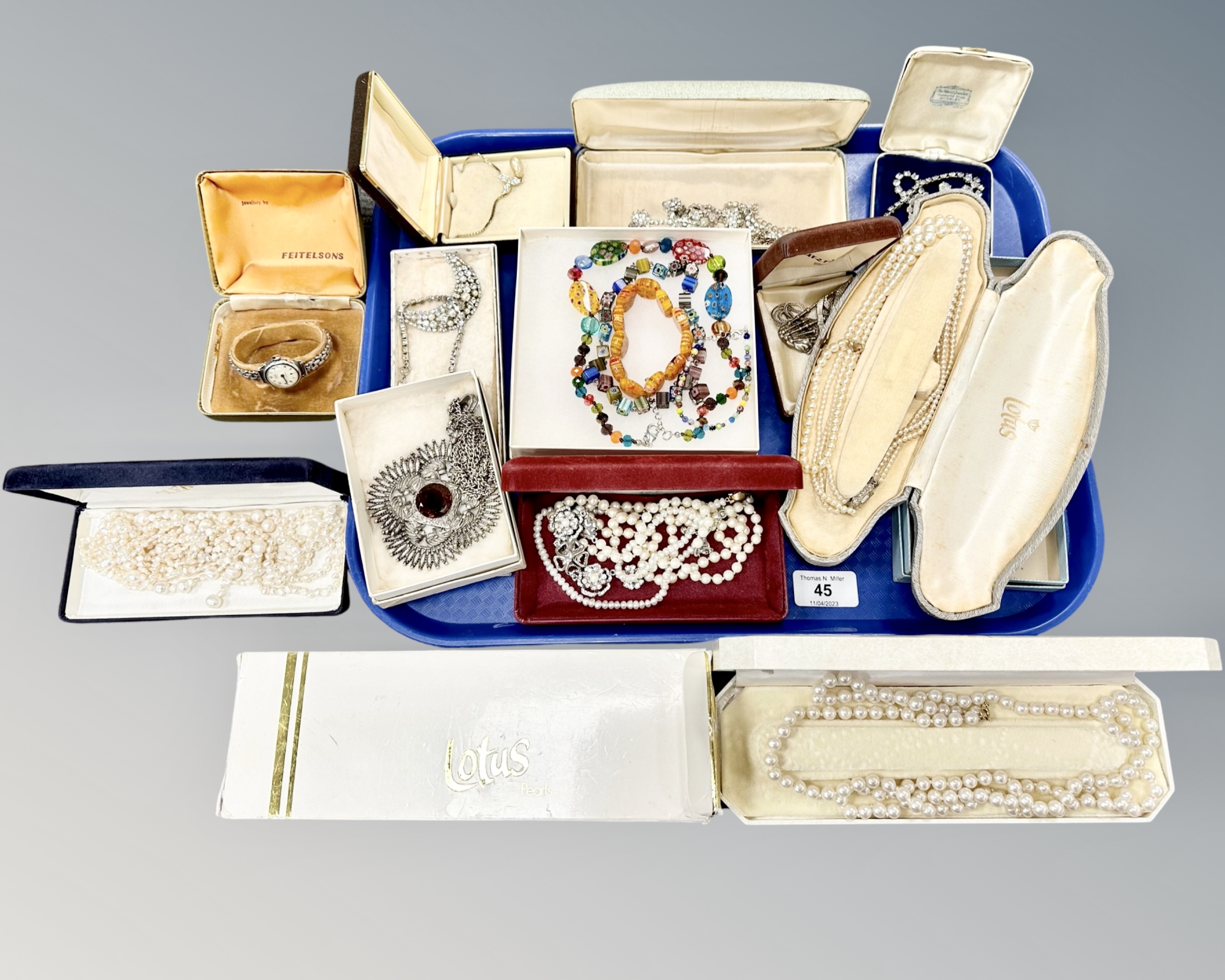 A quantity of costume jewellery, pearl necklaces,