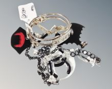 An acrylic costume jewellery for Coco Chanel Kishimoto and Devine together with a further Dior