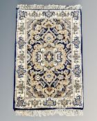 A small Iranian rug 40 cm x 60 cm