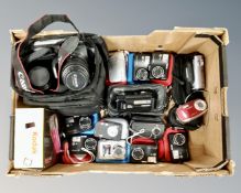 A box of assorted digital cameras,