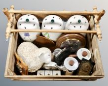 A vintage pine crate containing kitchen wall racks, storage jars, mid century tea ware,