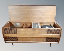 A mid century HMV solid state stereogram in cabinet