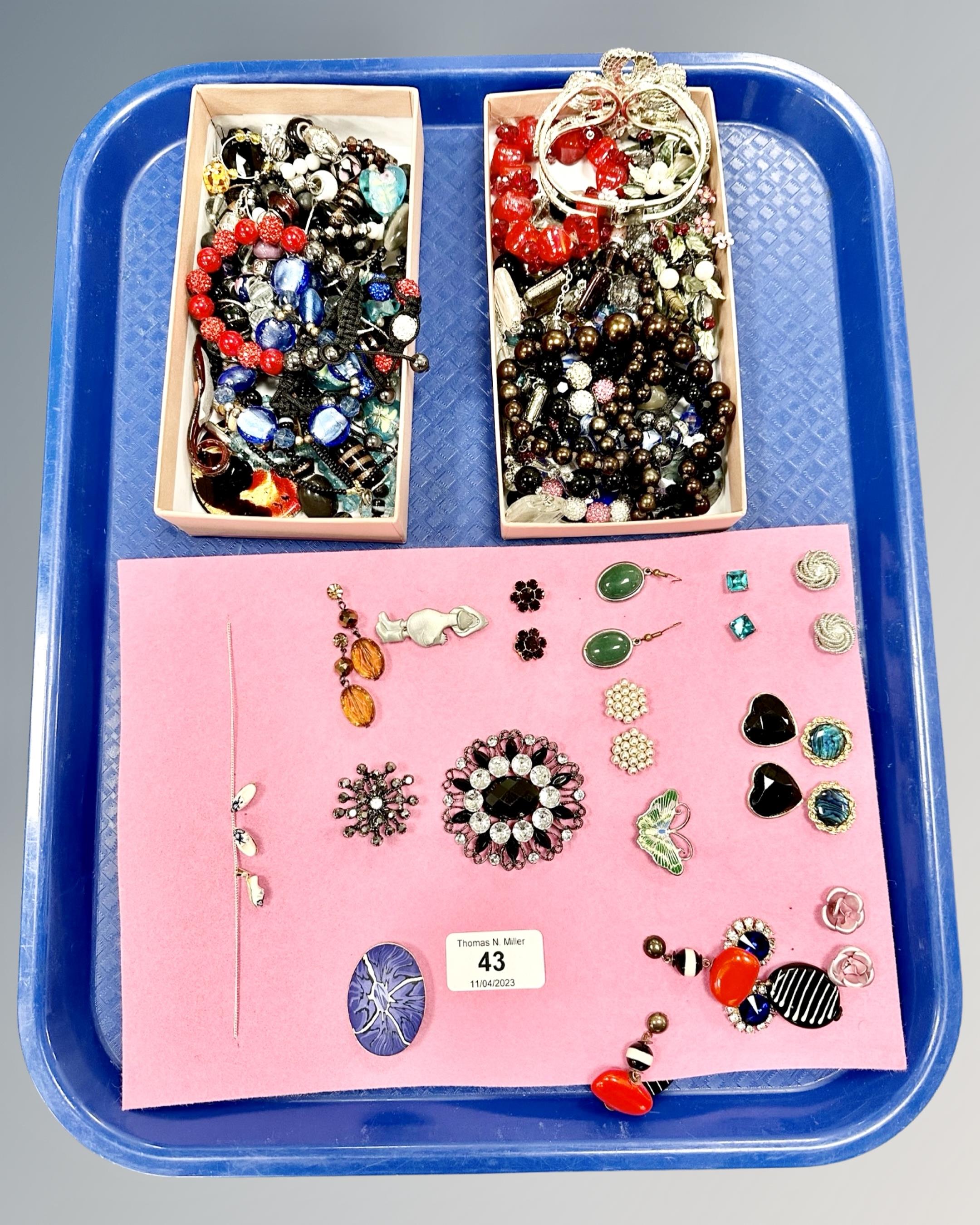 A collection of costume jewellery, earrings,