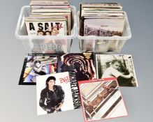 Two crates of vinyl LP's, The Beatles, Queen, Michael Jackson, Robert Palmer,