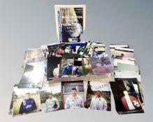A large quantity of photographs relating to Newcastle United, many bearing signatures.