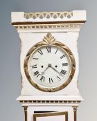 A Scandinavian painted longcase clock with pendulum and key