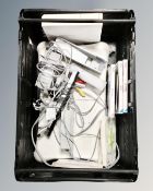 A crate of Nintendo Wii console, leads and games,