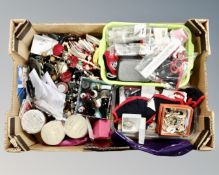 A box of costume jewellery, cloth face masks,