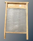 An antique pine and metal wash board