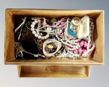 A plywood box containing costume jewellery, lady's fob watch,